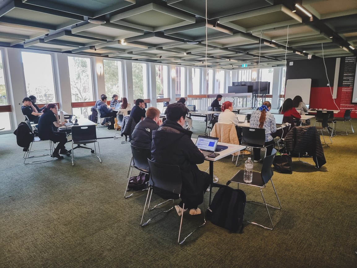 Hackathon participants working on their projects