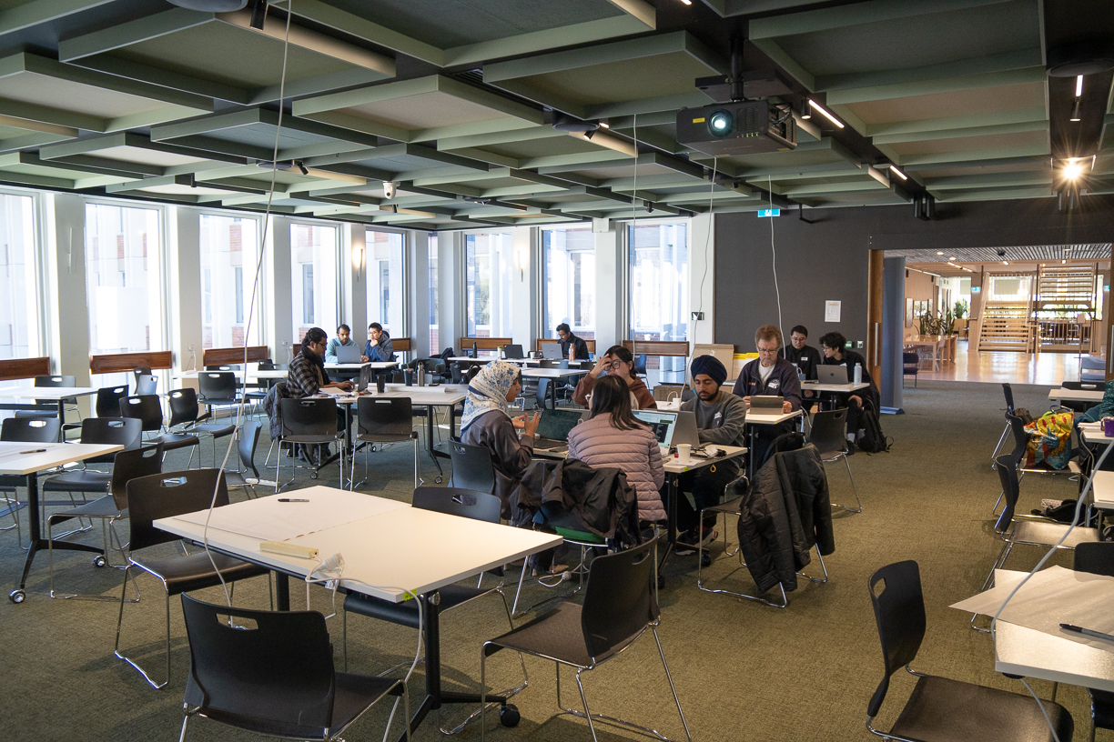 Hackathon participants working on their projects